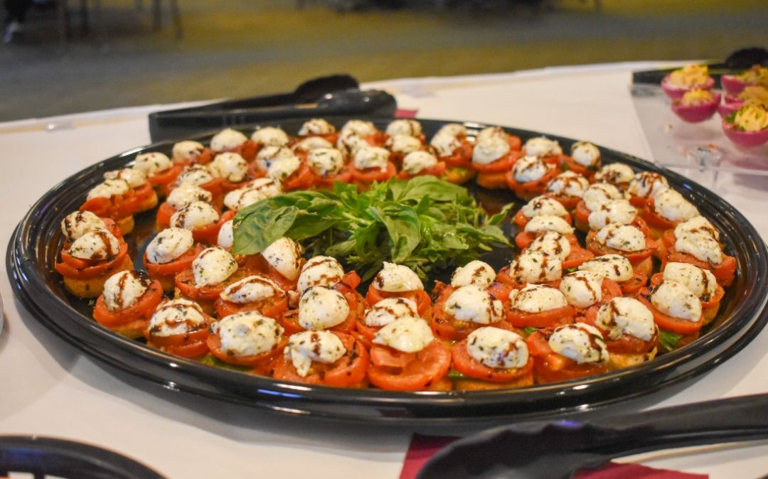 Bite-sized catered appetizers at Café 100 at Willow Brook Run in Delaware, Ohio, illustrating the variety of dining and event programming for residents.